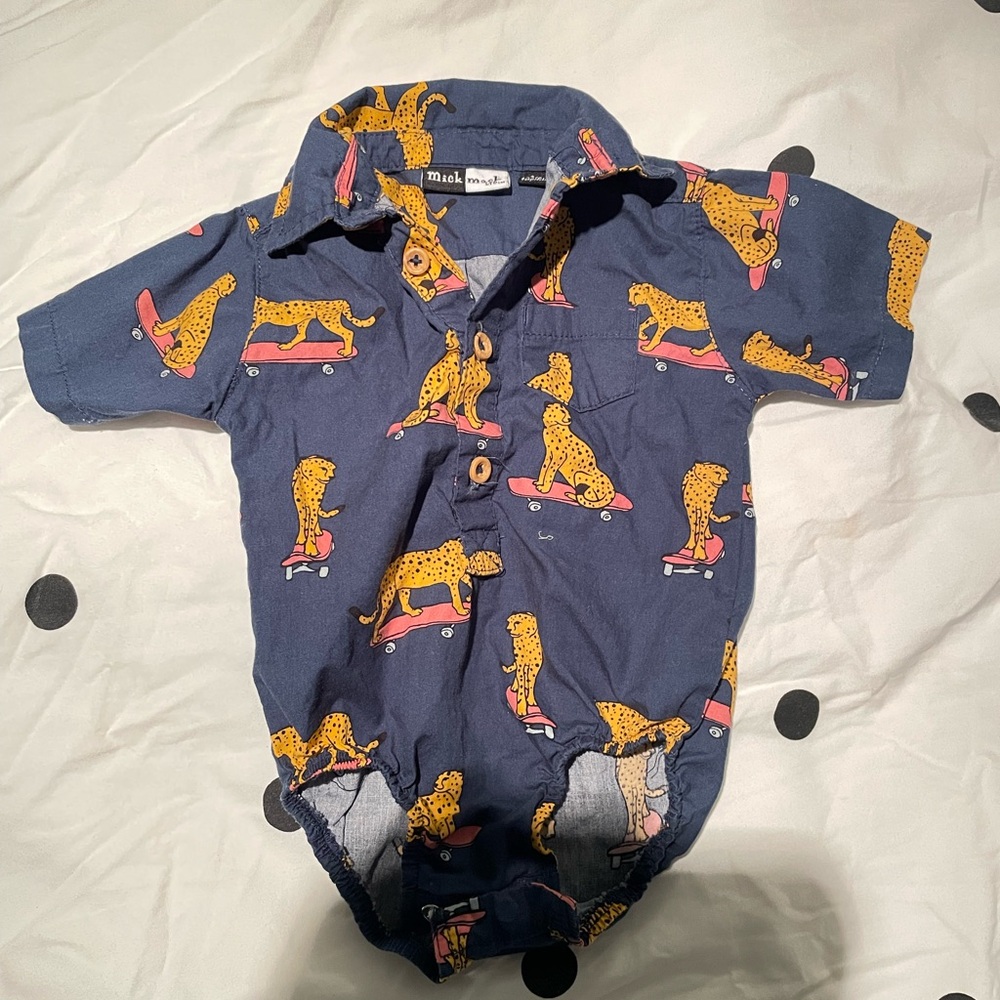 Stylish Blue Bodysuit with Skating Cheetah Print